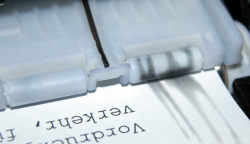 Rollerprits I: Verschmutzte Papierführungsrollen sorgen für Stempel auf dem Papier.