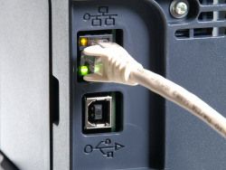 HP Color Laserjet CP2025n: Ethernet on top, USB below.