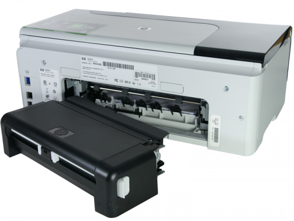 HP Officejet Pro 8000: Duplex unit on the backside. It turns the sheets automatically.