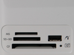 Cardreader: For direct print (slots to the left), Pictbridge (slot right side).