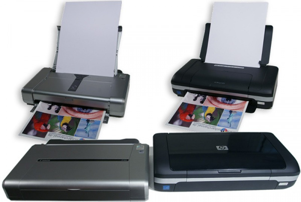 Mobile printers: Canon´s Pixma iP100 on the left, HP´s Officejet H470 to the right.