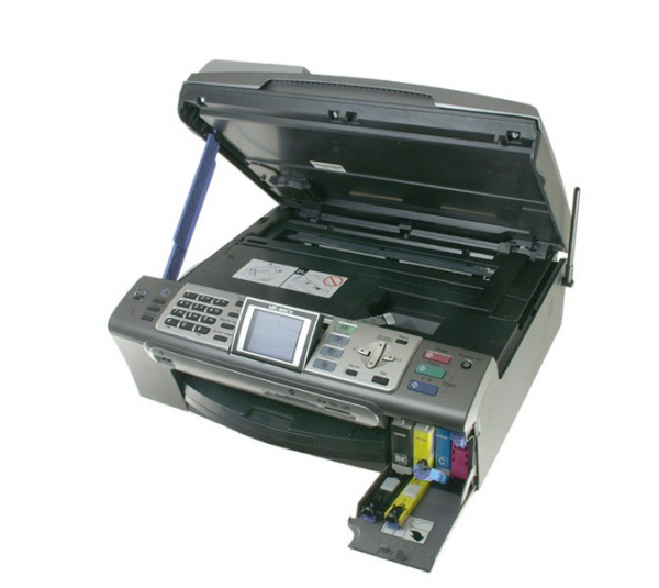 Brother MFC-845CW: Cover needs to be opened only to connect USB-cable - cartridges are exchanged on the frontside.
