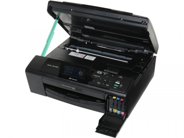 Brother DCP-J515W: The big upper cover allows access to USB- and network-connections. Ink tanks are replaced via the small cover on the right front side.