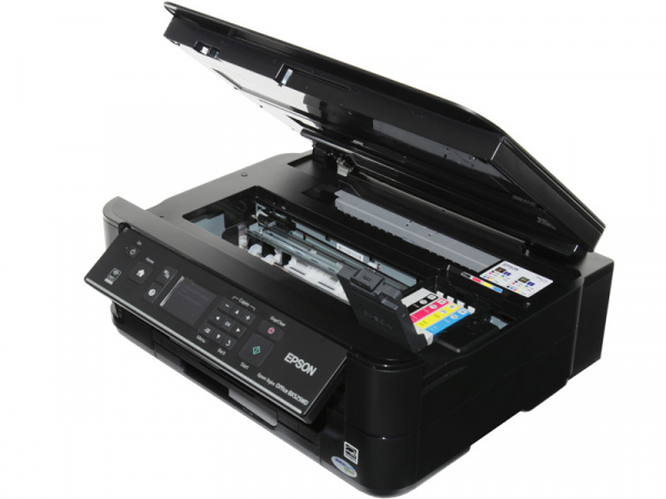Epson Stylus Office BX525WD: Somewhat difficult to replace ink tanks: The upper cover opens to the back, the ink tanks´lid to the front.