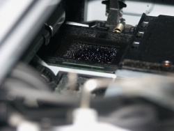 Waste-Ink-Behälter: Etwas Tinte geht auch beim HP in einen Auffangschwamm.