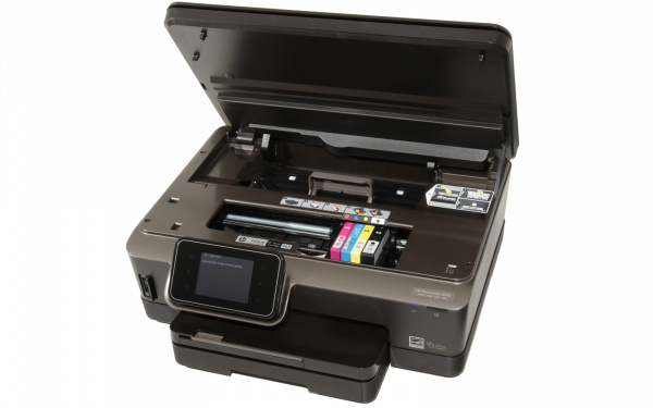 HP Photosmart 6510: Wie beim Canon fährt der Patronenwagen zum Austauschen in die Mitte, sobald man den Druckerdeckel angehoben hat.