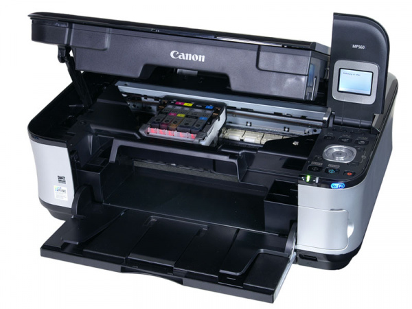 Canon Pixma MP560: One hand can open and close the cover.