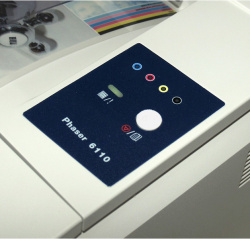 Xerox Phaser 6110N: LED and a multifunctional button.